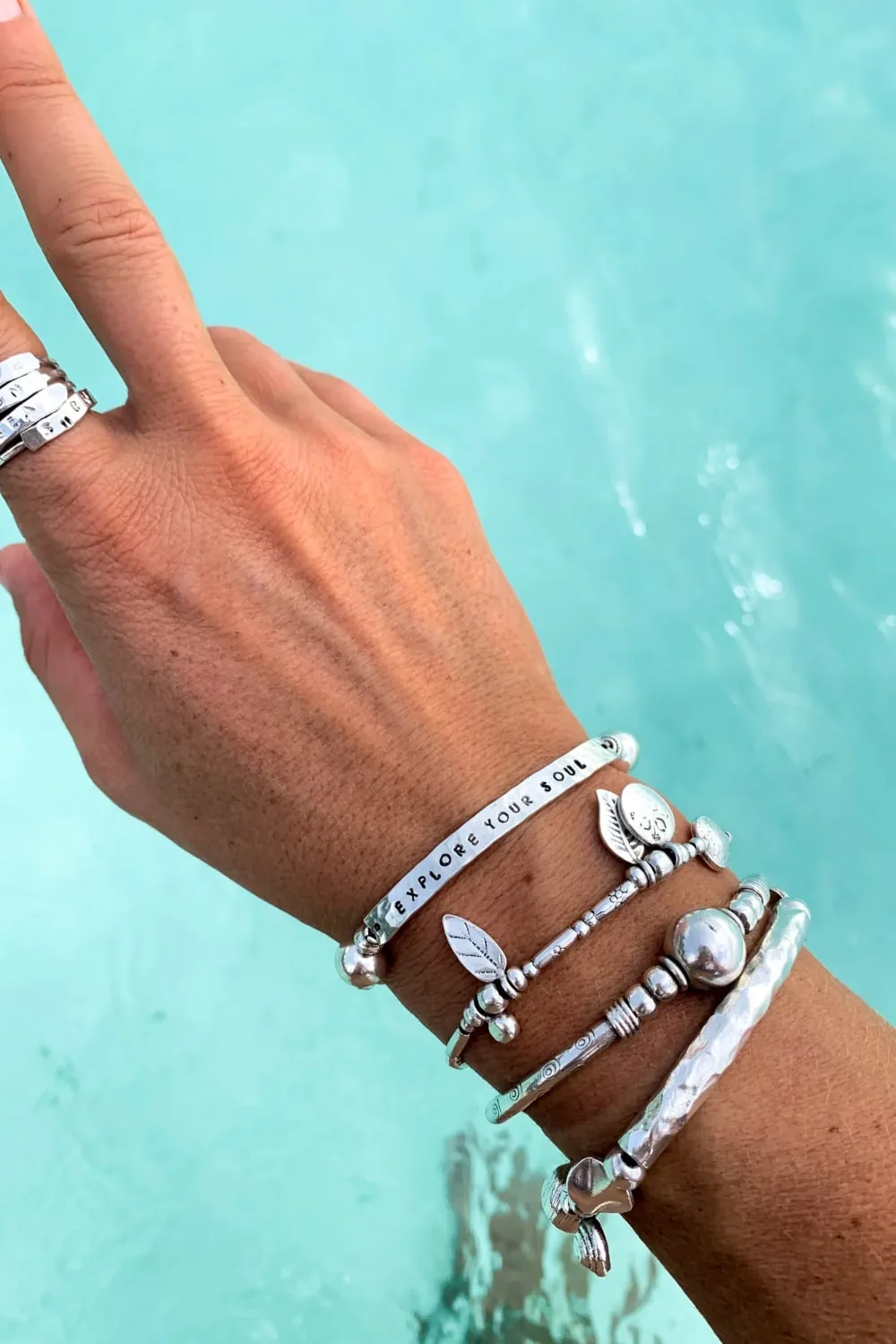 customisable hand stamped bracelet. sterling silver stretch bracelet for the active adventurer. water safe