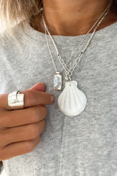 ocean inspired silver necklace with large clam shell pendant. Handmade in australia ocean safe. Perfect for layering in a necklace stack