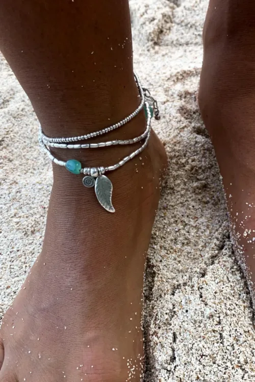 ocean inspired silver jewellery. Pure silver wrap bracelet with silver feather charm and chrysoprase gemstone - for a beach vibes look- water safe for everyday wear. 3 styles in 1