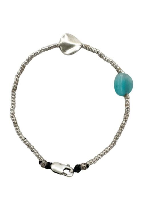 minimal style silver bracelet with small ammonite gemstone. ocean safe. rug proof - perfect for active mums