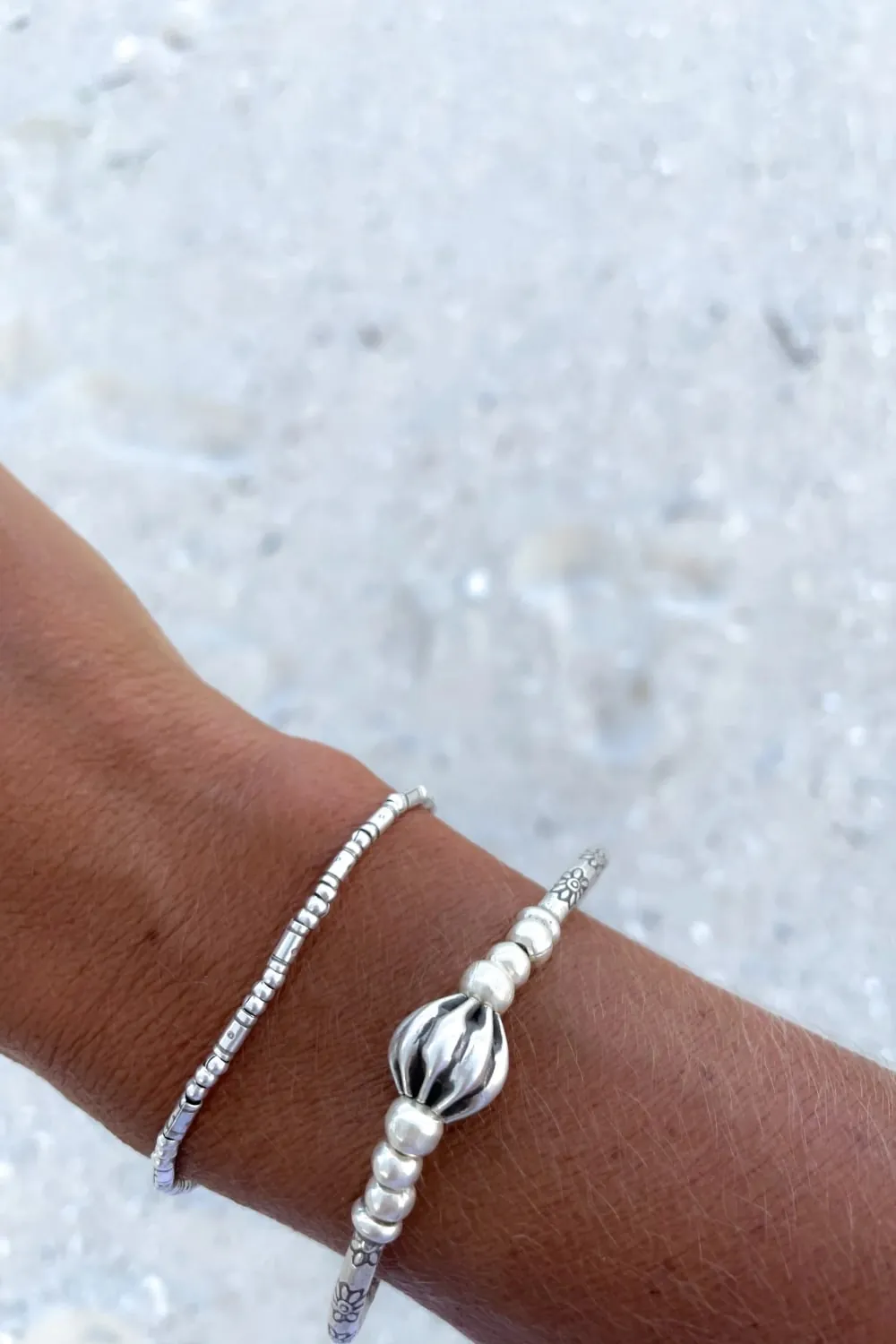 pure silver curve bar bracelet. Minimal style and great to add to a bracelet stack. Perfect for everyday wear. Ocean safe
