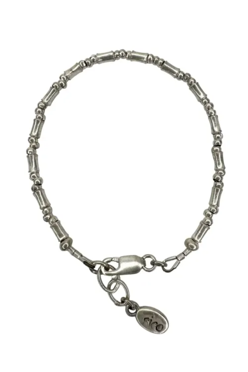 pure silver bracelet perfect two add texture to a bracelet stack. bamboo like silver minimal style bracelet