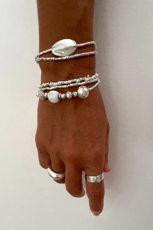 pure silver bracelet perfect two add texture to a bracelet stack. bamboo like silver minimal style bracelet