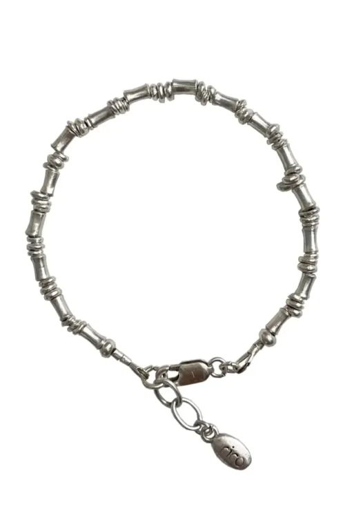 pure silver bracelet perfect two add texture to a bracelet stack. bamboo like silver minimal style bracelet