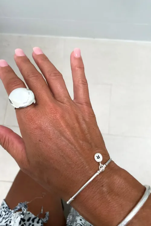 pure silver memory wrap bracelet. Customisable initial charm pendant. Personalise this bracelet your way.