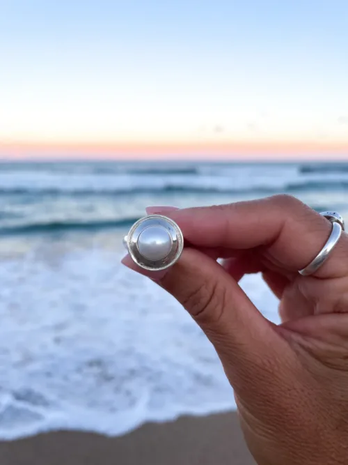 sterling silver ring with peal. Water safe