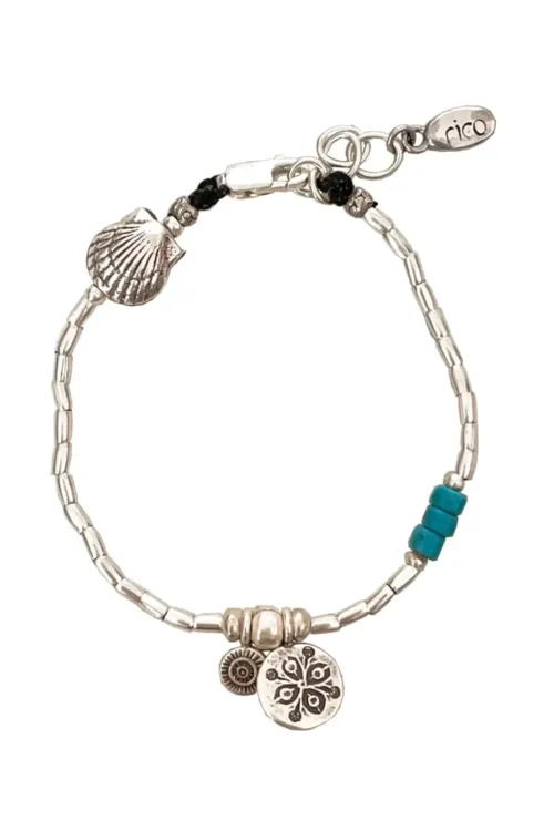 pure silver bracelet with heist turquoise. tug proof -for active mums. ocean safe
