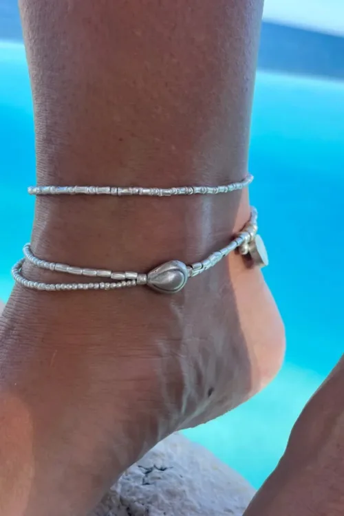 simple style pure silver anklet with bamboo like texture. silver cowrie shell anklet. made to wear everyday. Staple jewellery - ocean safe