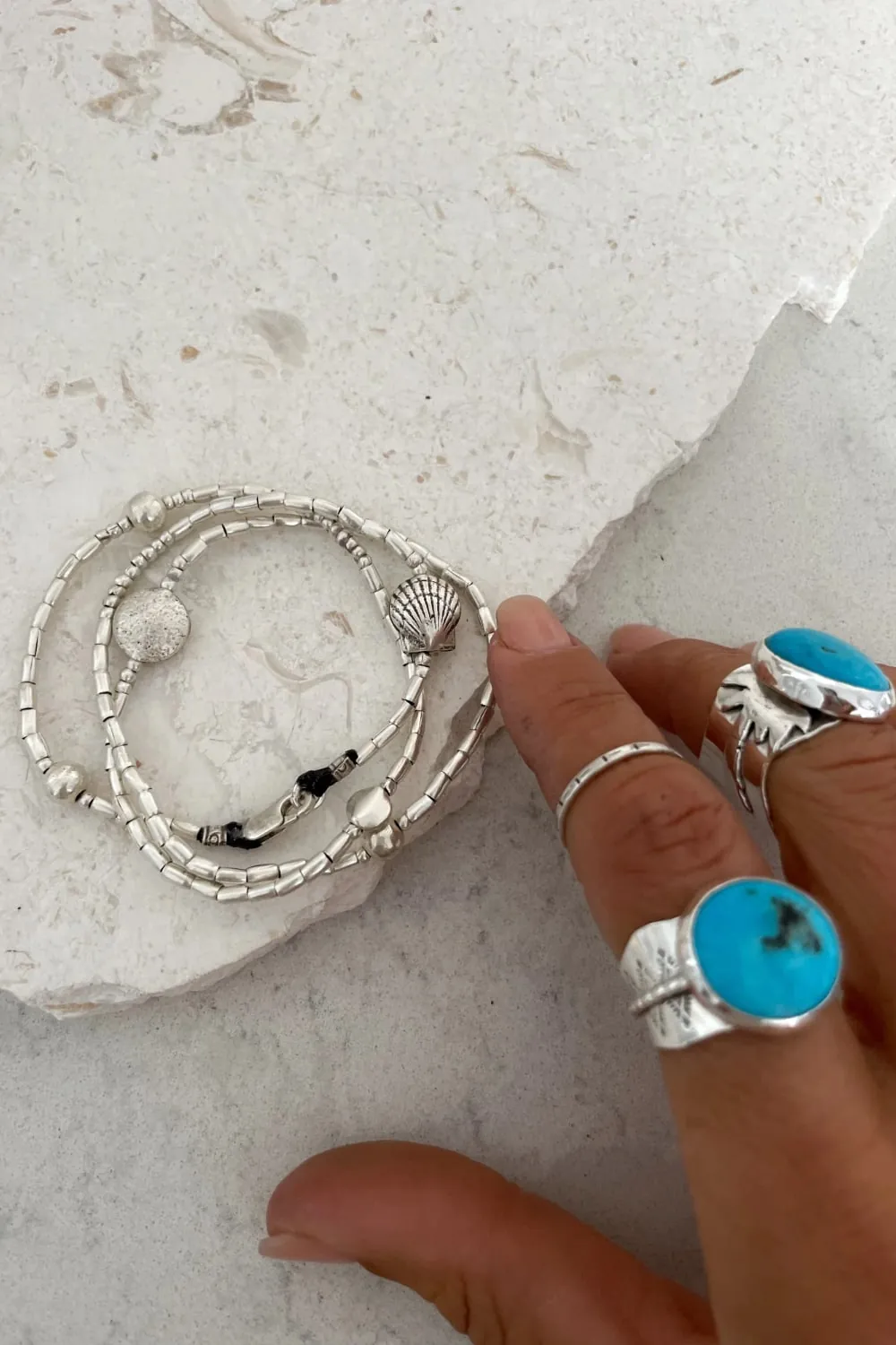 beach inspired pure silver triple wrap bracelet. style it 3 ways. bracelet, anklet or necklace. featuring silver shells. water safe