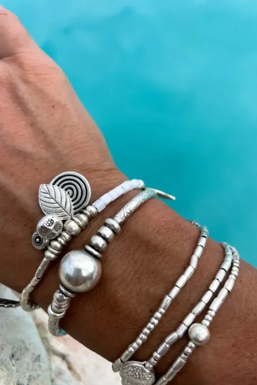 beach inspired pure silver triple wrap bracelet. style it 3 ways. bracelet, anklet or necklace. featuring silver shells. water safe