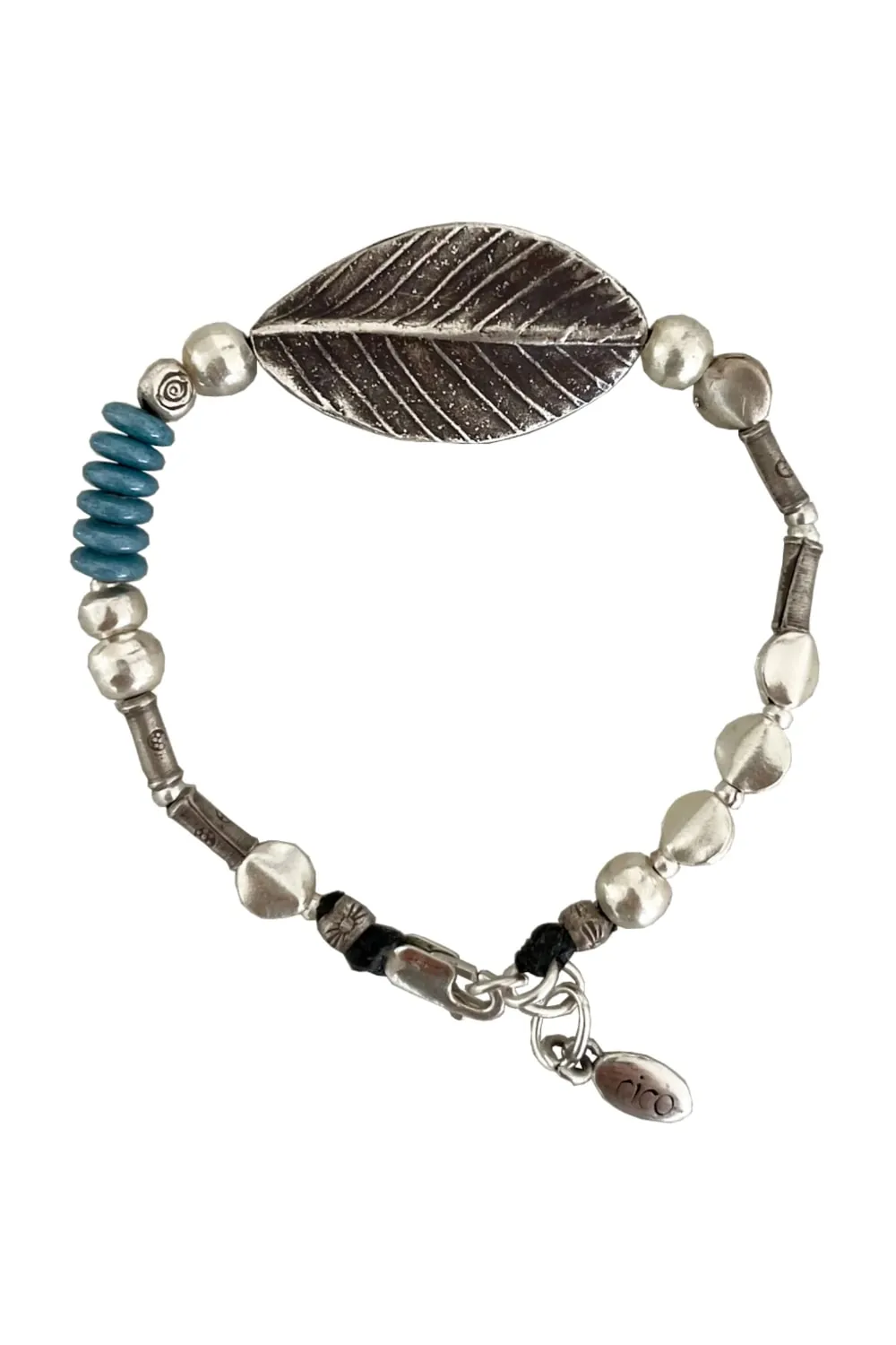 pure silver bracelet with large leaf centre. and pop of colour for your summer bracelet stack. ocean safe silver jewelry