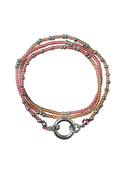 Handmade pure silver wrap bracelet featuring peach colour seed beads – a great minimal wrap bracelet style for everyday wear