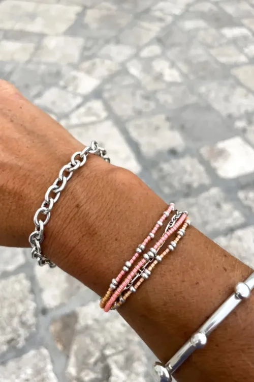 Handmade pure silver wrap bracelet featuring peach colour seed beads – a great minimal wrap bracelet style for everyday wear