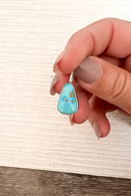 handmade sterling silver tear shape pendant with genuine turquoise. Handmade in Sydney, Australia. Ocean safe