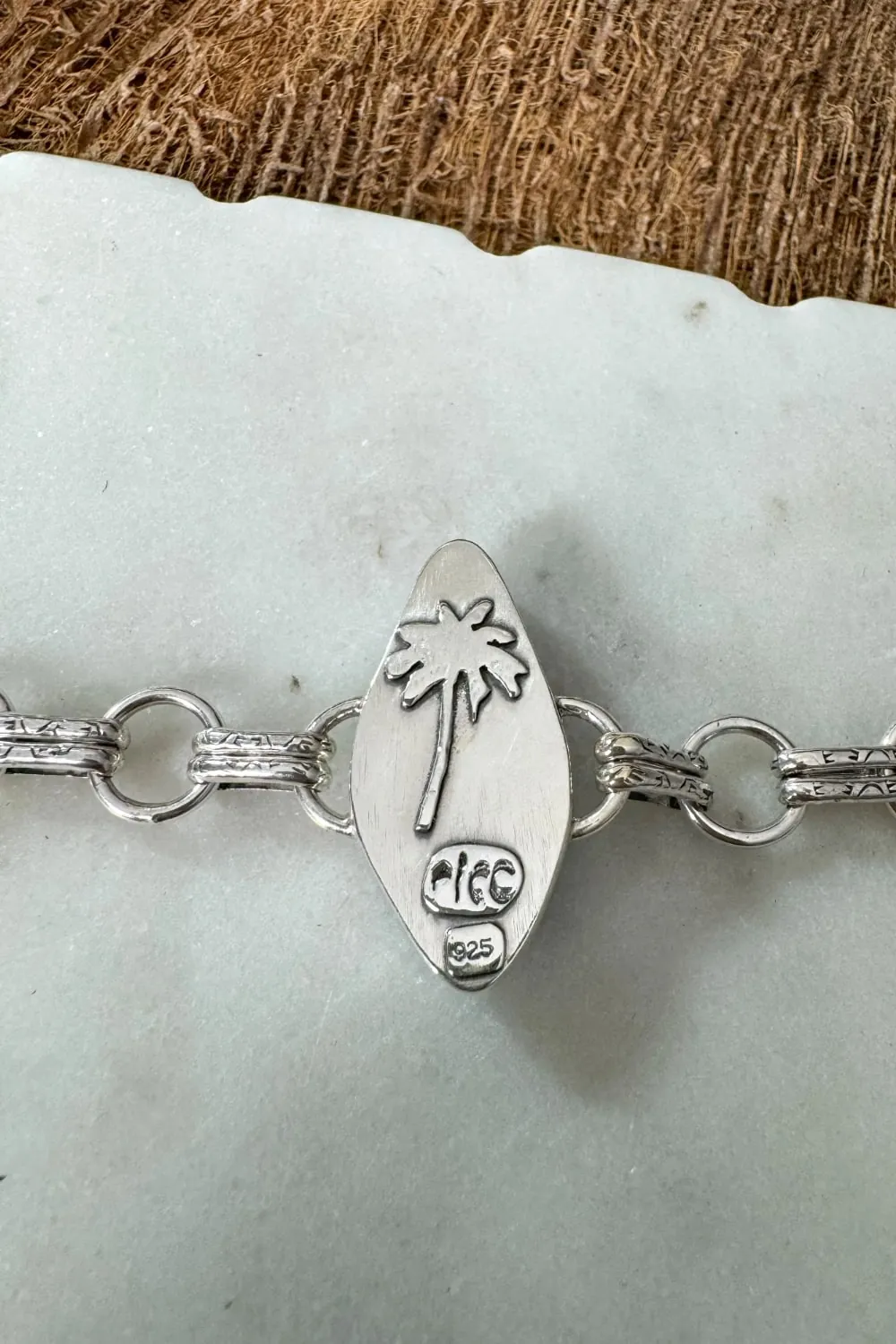 Handmade sterling silver round chain link bracelet featuring large genuine turquoise gemstone- and silver palmtrees detailhandmade in Australia by Rico Designs Jewellery