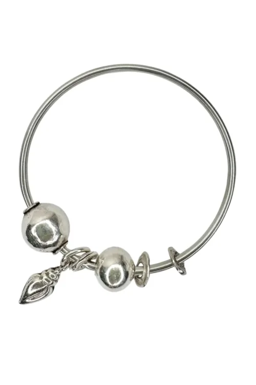 sterling silver bangle with pure silver ball beads and shell charm tassel. Handmade and ocean inspired. ocean safe and perfect to wear everyday