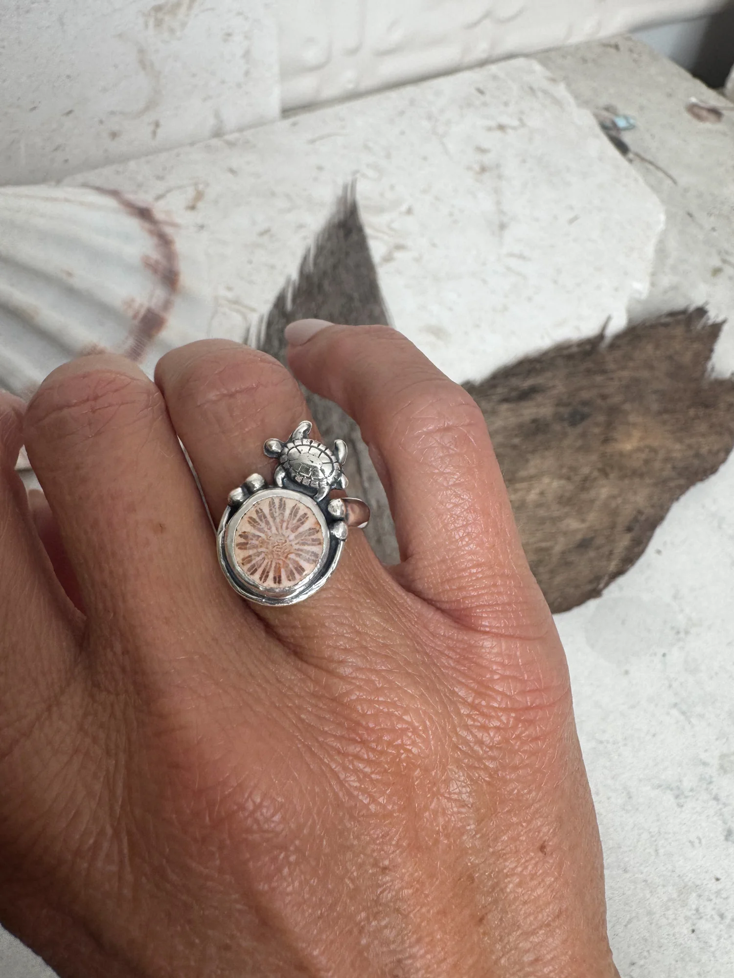 handmade sterling silver fossilised coral ring. inspired by the ocean. Unique jewellery