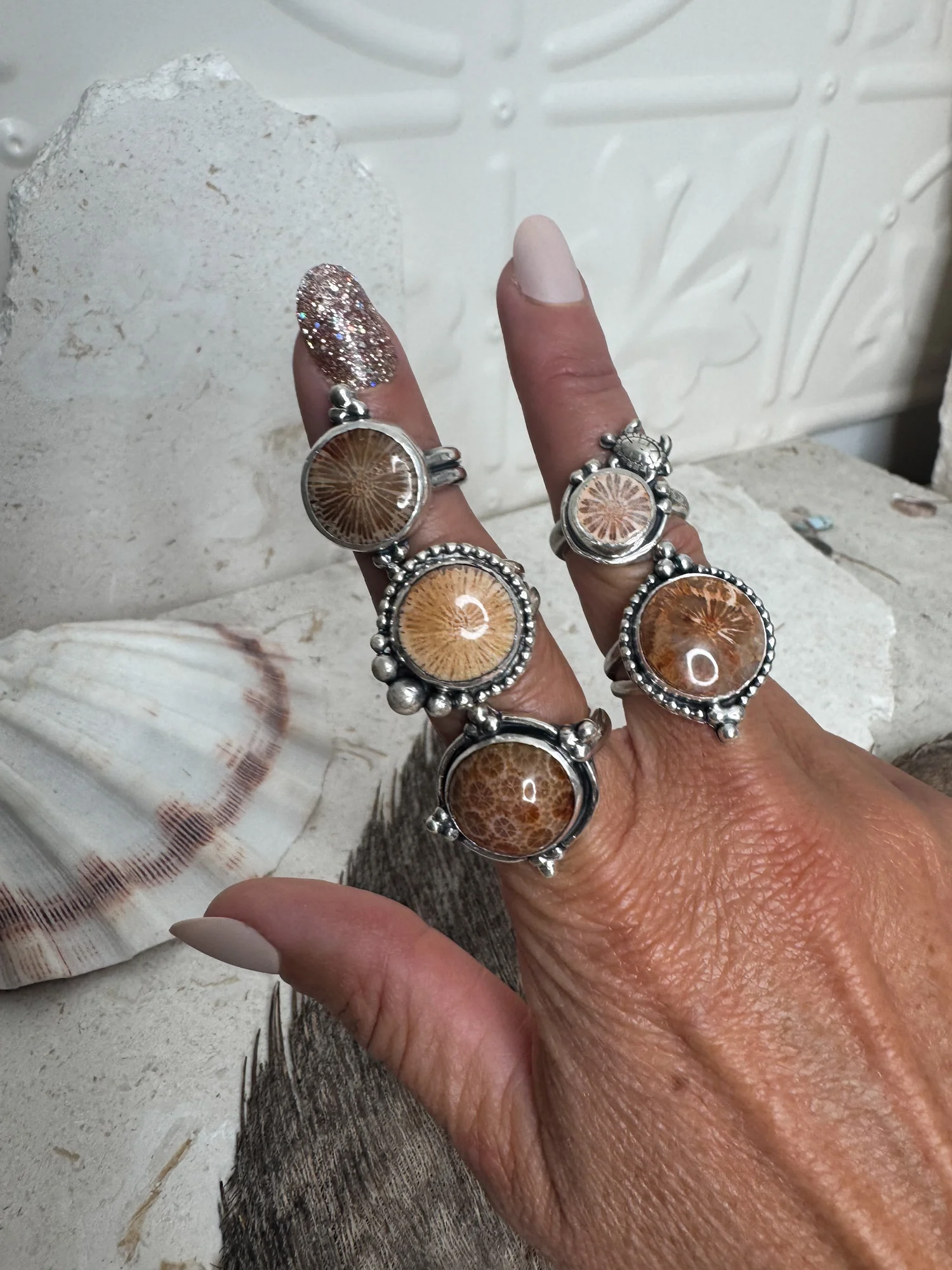 handmade sterling silver fossilised coral ring. inspired by the ocean. Unique jewellery