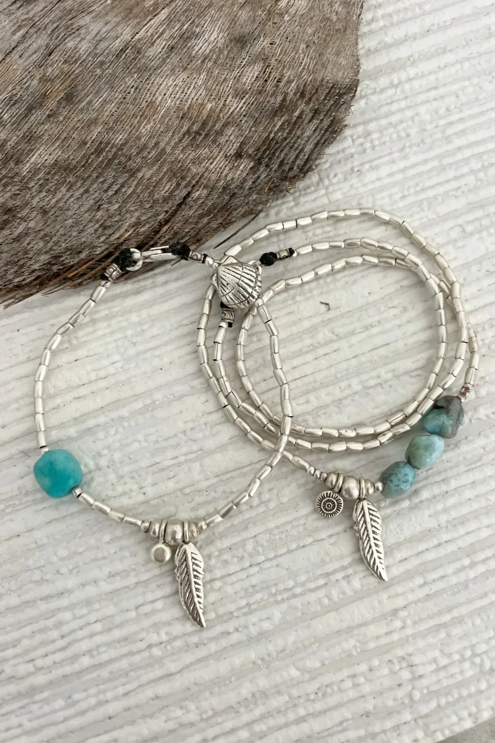 ocean inspired silver jewellery. Pure silver wrap bracelet with silver feather charm and larimar gemstones - for a beach vibes look- water safe for everyday wear. 3 styles in 1