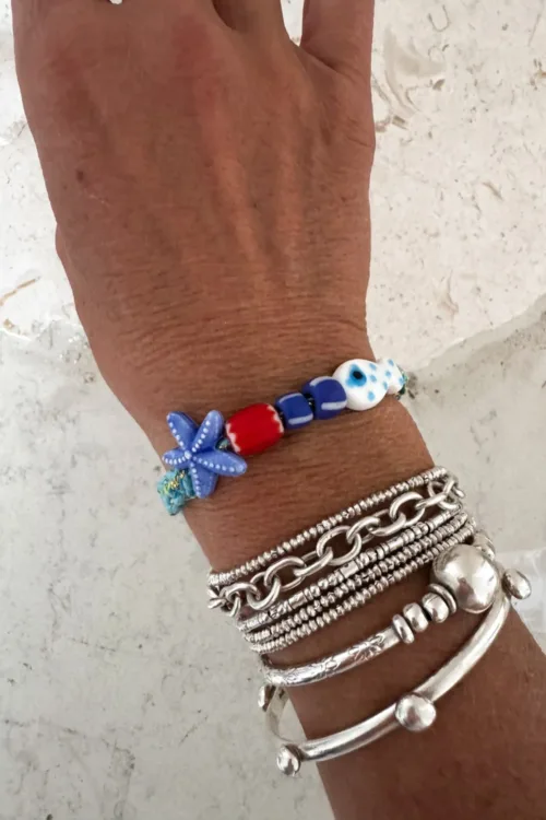 fish macrame bracelet adjustable colourful purple. perfect to add colour to a bracelet. stack this summer.