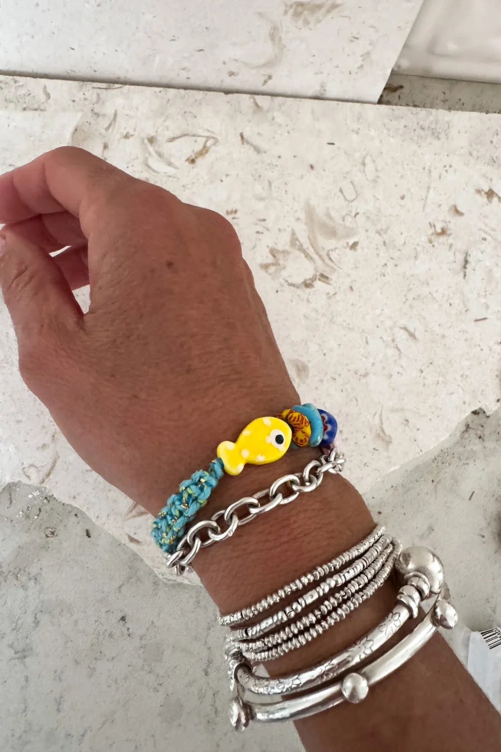 fish macrame bracelet adjustable colourful purple. perfect to add colour to a bracelet. stack this summer.