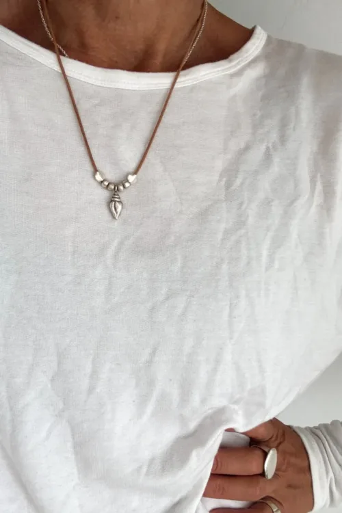 minimal style leather necklace with pure silver details and silver charm