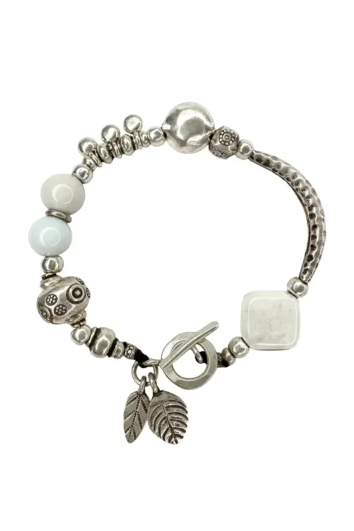 unique handmade pure silver bracelet with white glass beads. Looks great in a bracelet stack. Ocean safe and tug proof for mum life