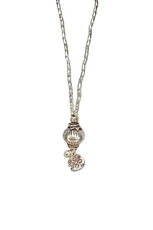pure silver medium to long necklace with detailed feature ball and charm tassel. Ocean safe handmade jewellery