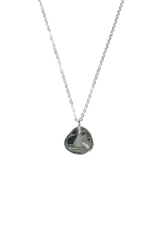 organic disc pendant on fine sterling silver chain necklace. Handmade and ocean safe
