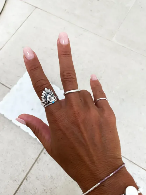 double stack sterling silver ring with crystal quartz and feather design. boho style. ocean safe