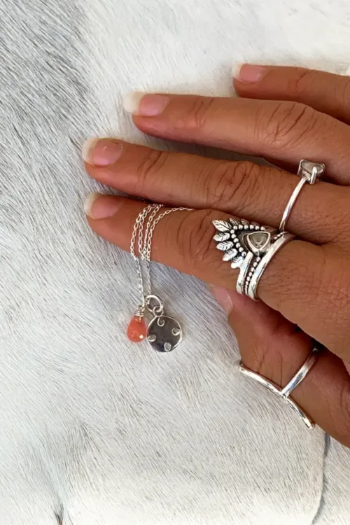 petite sterling silver round pendant on sterling silver chain with gemstone add on. handmade and ocean safe. Wear everyday