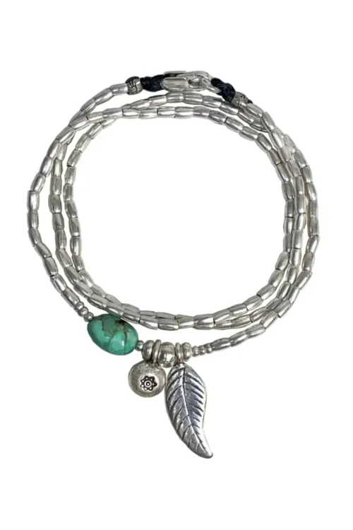 ocean inspired silver jewellery. Pure silver wrap bracelet with silver feather charm and chrysoprase gemstone - for a beach vibes look- water safe for everyday wear. 3 styles in 1. tug proof