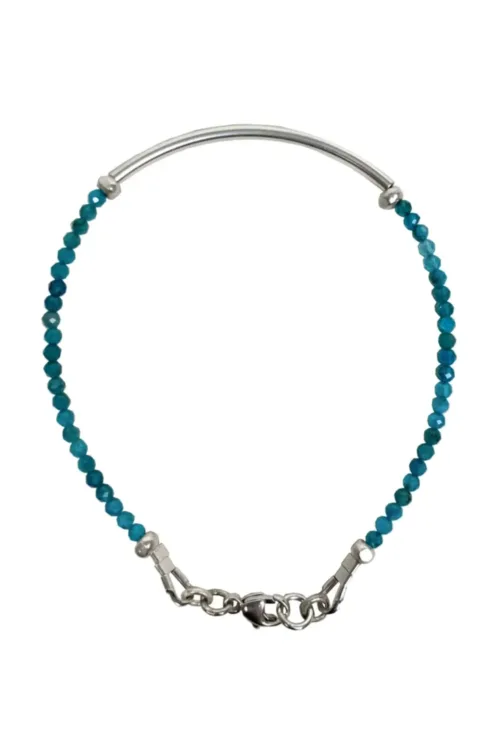 sterling silver curve bar bracelet with small faceted gemstones. wear solo or stacked up.