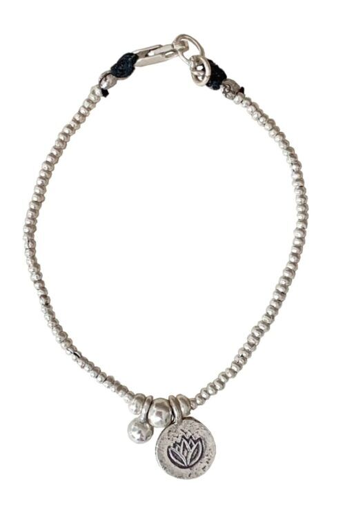 pure silver bracelet with lotus flower pendant. tug proof - perfect for active mums. ocean safe