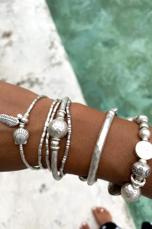 ocean inspired silver jewellery. Pure silver wrap bracelet with clam shell for a beach vibes look- water safe for everyday wear. 3 styles in 1
