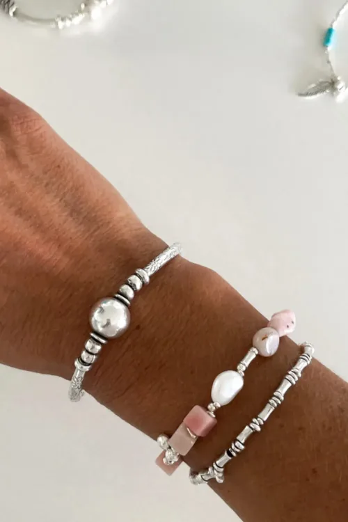 pink opal gemstone and silver women's bracelet. looks great worn by itself or in a bracelet stack.