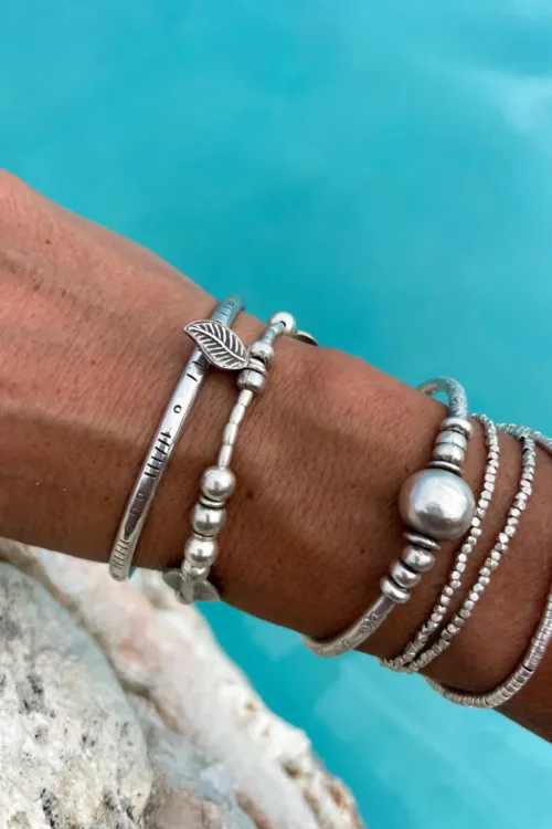 pure silver women's bracelet. heart and shell details - ocean safe. beach girl vibes