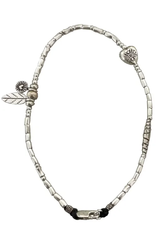 pure silver anklet minimal design. Feature ring silver heart charms. Ocean safe and perfect to wear everyday.