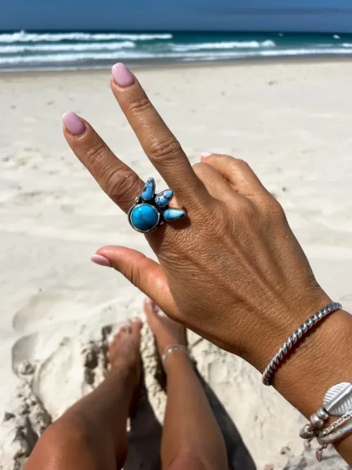 handmade turquoise ring. featuring Kingman turquoise and golden hill turquoise. Unique one of a kind bohemian style ring.