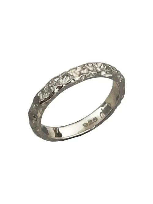 sterling silver ring with molten texture and cubic zircon. ocean safe, great for stacking