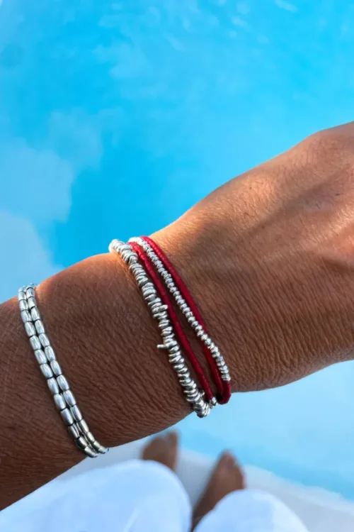 Handmade pure silver wrap bracelet featuring red colour seed beads – a great minimal wrap bracelet style for everyday wear