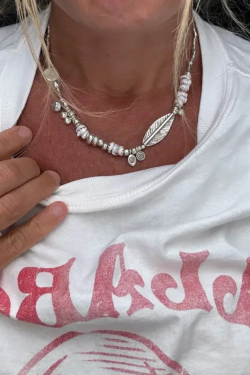 beach inspired chunky pure silver necklace with natural tiger shells. Handmade in Sydney Australia, ocean safe. Scattered shells silver necklace