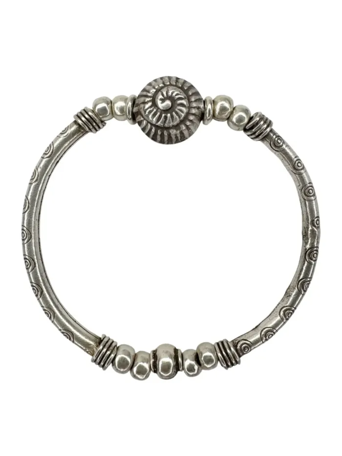 beach inspired pure silver curve bar stretch bracelet with silver spiral shell. perfect for everyday wear and bracelet stacking. ocean safe