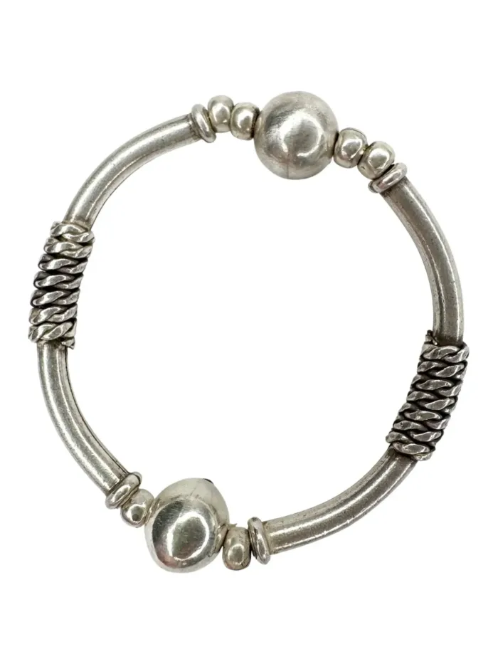 solid pure silver curve bar stretch bracelet. Easy to slip oxn and off. Ocean safe and strong. looks great in a bracelet stack