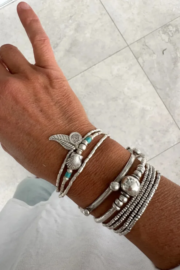 ocean inspired silver jewellery. Pure silver wrap bracelet with clam shell for a beach vibes look- water safe for everyday wear. 3 styles in 1