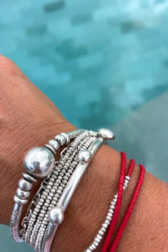 handmade sterling silver bangle with recycled silver blobs - ocean safe jewellery