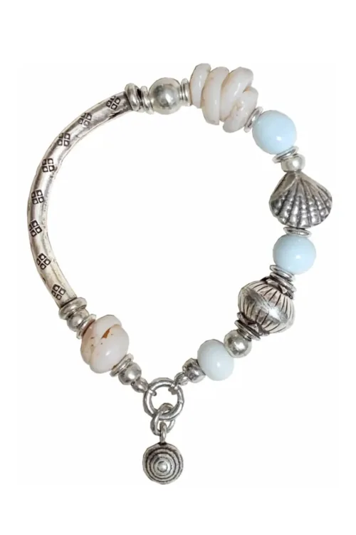 beach inspired pure silver bracelet with natural shell resort style jewellery