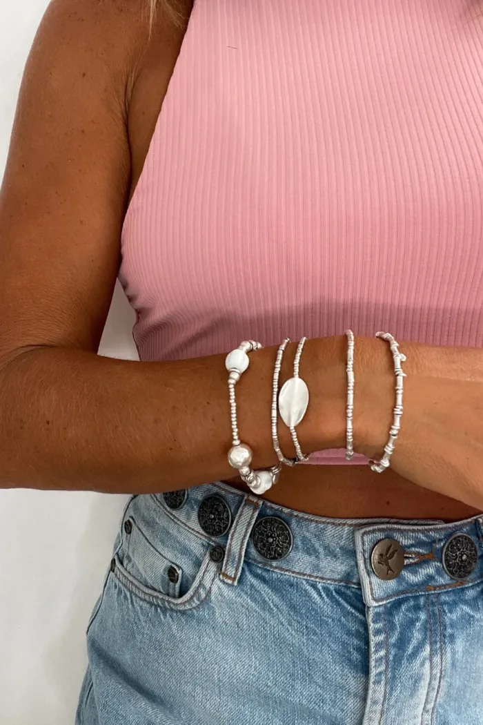 pure silver bracelet perfect two add texture to a bracelet stack. bamboo like silver minimal style bracelet