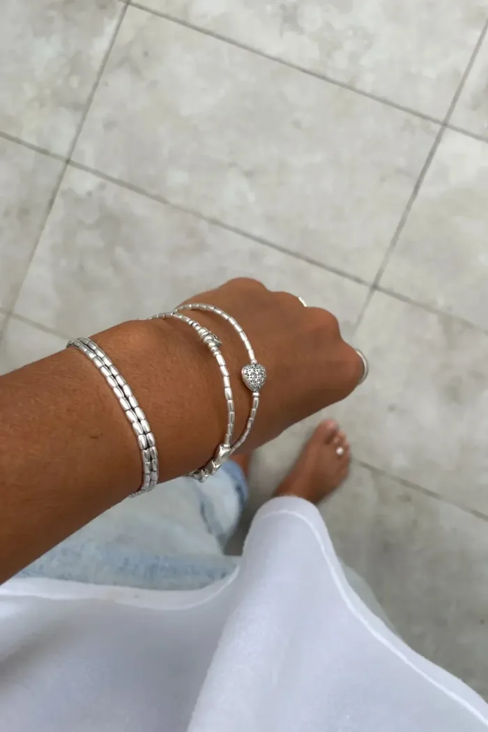 memory wire double wrap bracelet with pure silver and silver heart charms. Customisable charm pendant