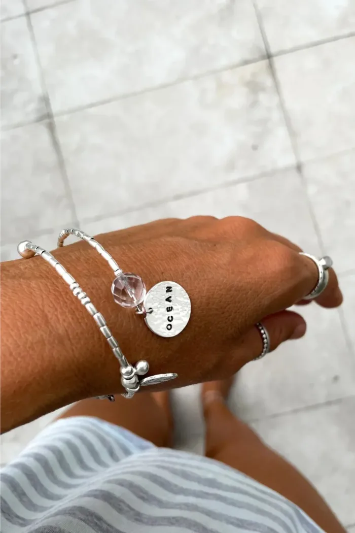memory wire double wrap bracelet with pure silver and crystal quartz gemstone. Customisable charm pendant